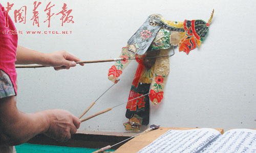民间皮影戏班每场赚200
