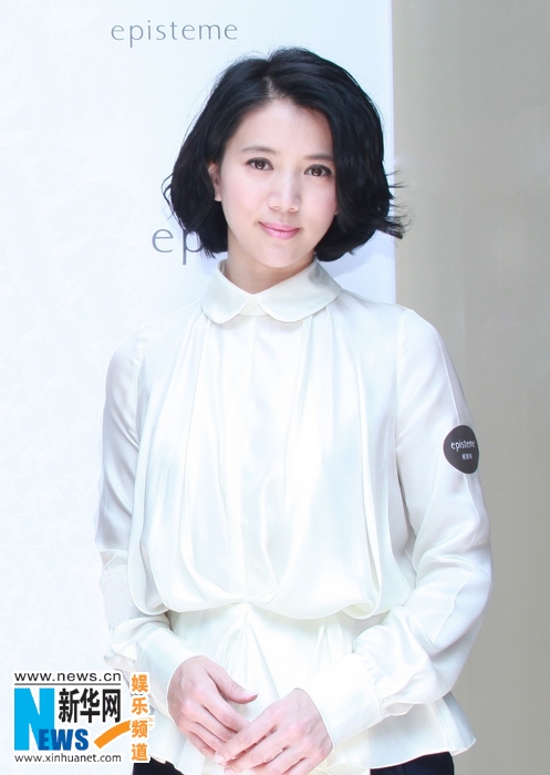 袁咏仪上海温婉代言白衫衬无暇肌肤展知性美图