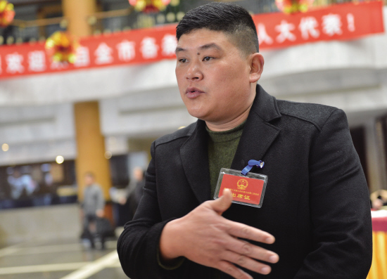 王炎明(市人大代表,黄泽镇前良村党支部书记)