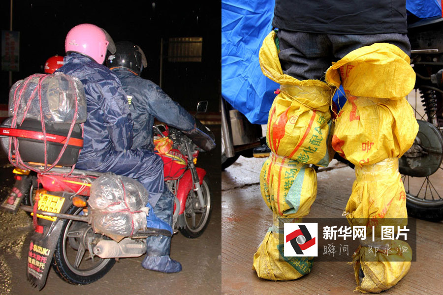 广西"铁骑大军"寒潮中返乡 腿绑麻袋保暖防尘新华网无人机航拍大雪中